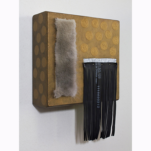 deep gold w fur & fringe contemporary Indigenous Native American color field and geometric abstract painting with fur and bicycle inner tube fringe tribal adornment by matriarchal First Nations Plains Cree Anishnawbe artist Bebonkwe Brown (gold, black and white colors)