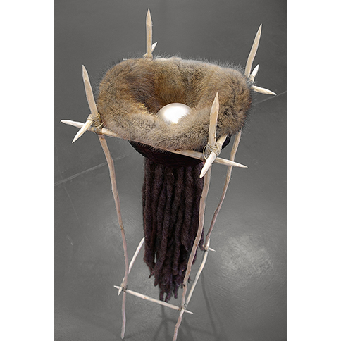 his nest contemporary multimedia Indigenous Native sculpture with sticks, fir, sinew, wool and glass ball by First Nations Plains Cree Anishnawbe Metis artist Bebonkwe Brown