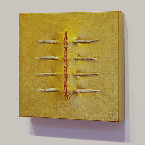 small gold scar contemporary Indigenous Native American abstract minimalist acrylic painting with piercing sticks and sinew sewing by matriarchal First Nations Plains Cree Anishnawbe artist Bebonkwe Brown (gold and natural wood colors)
